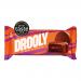 A Drooly Chocolate item from Drooly Bakery sits on a neutral background. The wrapper shows rich brown tones, a bold logo and glossy highlights. The image captures textured chocolate graphics, a folded seam on the packaging and soft studio lighting reflecting off the surface.