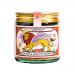 A clear glass jar reveals a coarse, colorful spice mix of orange-red chili flakes, toasted sesame seeds and bright green horopito flecks. An orange label with simple black text wraps the jar; a black shaker lid caps the compact 50g bottle.