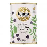 Six matte cans of Biona Organic Beluga Lentils sit in a neat row, each can showing a green-and-white label with the Biona logo, product name and an image of small black lentils. Cans rest on a white surface with soft shadows and bright, even lighting. Fine print and organic logos appear on the label
