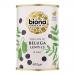 Six matte cans of Biona Organic Beluga Lentils sit in a neat row, each can showing a green-and-white label with the Biona logo, product name and an image of small black lentils. Cans rest on a white surface with soft shadows and bright, even lighting. Fine print and organic logos appear on the label