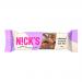Image shows a wrapped N!Cks Vegan Nut Bar labeled Almond Crunch. The wrapper displays the N!Cks logo and Vegan mark, warm beige and green tones, photos of almonds and nut clusters, clear weight text (40g) and compact, modern retail packaging suggesting a multi-bar box. It has matte finish and icons