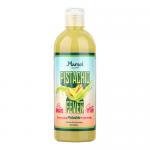 Marsel Delights pistachio dessert sauce bottle appears upright with a glossy green label and a clear window revealing smooth, pale-green sauce. A drizzle arcs from a spoon, showing creamy texture and tiny nut flecks. The cap is metallic and the label shows pistachio imagery. On pale marble backdrops.