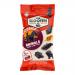 Photo shows a small glossy packet of Van Slooten confectionery. The front displays the brand logo, the words 'Sweet & Salty' and a clear window revealing dark licorice shaped like playful animals. Bright accent colors and illustrative animal silhouettes frame the packaging. Shiny accents catch view.