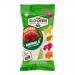 A brightly colored package sits against a white background, displaying a playful Van Slooten logo and illustrated safari animals. Translucent fruity gummies in lion, elephant, giraffe and monkey shapes spill beside the pouch, showing orange, red, green and yellow hues. A glossy, sugared sheen shows.