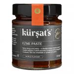 The photo shows twelve 200g jars of Kursat's Ezme paste arranged in a grid inside a cardboard tray. Each clear glass jar reveals deep red, textured paste; white labels feature the Kursat's Grocery logo and green-red accents, topped with silver lids. Soft light glints on lids, hinting coarse texture.