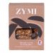 A colorful Zymi Organic biscuit pack rests on a neutral surface. The wrapper shows almonds, sesame seeds and an orange slice beside stylized golden biscuits; a transparent window reveals stacked round cookies, while the Zymi Bakery logo and organic label appear on the top.