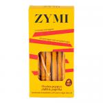 A clear plastic pack of twelve slender golden breadsticks sits upright, each stick flecked with bright red paprika and chili specks. A white label with bold green and red accents names the product while revealing the textured, rustic surface of the artisan sticks. Dusting of red crumbs, faint sheen.
