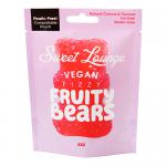 Photo shows a bright resealable pouch of Sweet Lounge vegan fizzy fruity bears. The colorful packaging features playful typography and fruit illustrations beside a clear window revealing sugar-coated gummy bears in orange, red, yellow, green and purple. Soft studio lighting adds glossy highlights.