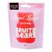 Photo shows a bright resealable pouch of Sweet Lounge vegan fizzy fruity bears. The colorful packaging features playful typography and fruit illustrations beside a clear window revealing sugar-coated gummy bears in orange, red, yellow, green and purple. Soft studio lighting adds glossy highlights.