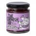 Six glass jars are arranged in neat rows, each filled with deep ruby beetroot chutney and sealed with silver lids. Clean white labels carry black lettering and a simple logo. Light highlights the glossy surface and chunky texture of the preserves.