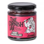 Six clear glass jars display deep ruby Cherry Bakewell jam. Cream labels with red borders and a vintage brand logo depict cherries and almonds. Shiny gold lids reflect light. The jars arrange on a worn wooden board against a soft neutral backdrop, jam glinting through glass.