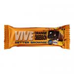 Glossy orange-and-brown wrapper displays the Vive logo and Orange Obsession label. A dense chocolate brownie with shiny ganache and candied orange zest sits beside the package on a rustic wooden board, crumbs and a halved orange accent the scene under soft studio lighting.