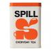 A cylindrical tin sits on a neutral surface, labeled 'Spill Tea' with stylized tea-leaf graphics. The lid tilts open to reveal stacked teabags in paper envelopes. Soft studio lighting casts gentle shadows; fine print and weight marking appear along the tin’s curved front. Background shows soft blur.