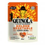 Brightly colored box of Quinola Organic Golden Veg Express Quinoa (250g) sits against a neutral background. The front panel shows the Quinola logo, golden quinoa grains and vegetable illustrations, clear product name text and a small transparent window revealing pale, flaked grains inside. Soft hue.