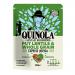 A sealed bag of Quinola wholegrain Puy lentils and expanded quinoa sits upright, its kraft-style paper and warm green label showing product name and brief icons. A clear window reveals small dark green lentils and pale, fluffy quinoa grains scattered at the base. Soft studio light adds gentle shadow.