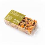 A dozen rectangular granola bars sit in neat rows on a metal baking tray. Golden-brown oats, seeds and sticky clusters of honey coat each bar, while bits of dried fruit and chocolate chips punctuate the surface. Crumbs scatter around, and warm light emphasizes the textured edges. A light honey glaze.