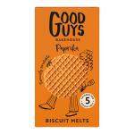 A stack of round paprika biscuit melts sits on a white plate, their golden-brown, flaky edges catching light. Paprika speckles dot the surface. One biscuit is broken to reveal soft, layered interior. Crumbs and a rustic bakery backdrop frame the scene. Warm side lighting creates soft shadows. Napkin