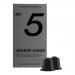 A compact grocery package labeled Coaltown and Jenkin Jones sits on a countertop. Dark, coal-inspired colors and bold typography frame a close-up of glossy capsule pods visible through a clear window. Simple icons and company details appear on the back panel. Matte finish and subtle seam lines. Soft