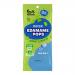 A bright green pouch faces the viewer, displaying scattered popped edamame crisps and a few whole edamame pods dusted with sea salt. The white 'Real Naturals' logo sits near the top, with 'Edamame Pops Sea Salt' flavor text and net weight printed along the lower edge.