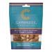 A glossy Cambrook Hickory Smoke seasoned giant corn bag sits upright. Amber roasted kernels show through a clear window, dusted with smoky spice. Orange and brown packaging displays the Cambrook logo and product name with subtle nut illustrations.