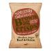 A kraft brown paper bag sits upright with a rectangular cream label bearing the Brown Bag Crisps logo and the flavour name 'Aberdeen Angus Beef & Onion' in bold type. An illustration of cooked beef and sliced onion appears beside a small pile of golden ridged crisps in front of the pack. Soft light.