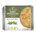 Glossy package displays stacked golden-brown round tortas with visible rosemary sprigs and thyme leaves. An olive oil illustration and a rustic cream label occupy the background, while clear branding and the net weight sit at the bottom; the crisply textured surfaces catch the light. Soft warm tint.
