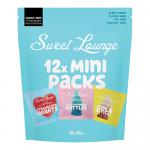 A clear multipack pouch sits in the foreground, revealing a cluster of colorful mini foil packs and several larger pouches arranged behind. Bright branding and assorted individually wrapped confections create a lively composition with glossy textures and contrasting pastel and bold hues. Subtle shine.