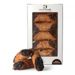 Close-up image shows six Swiss dark chocolate cannoli arranged in a clear tray beside a cream Di Santo & Family Bakery box. Each pastry features glossy dark-chocolate ends, golden crisp shells and a powdered center; chocolate shavings and soft studio light add depth. A small vintage logo is visible.