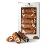 A rectangular 200g box displays six cannoli aligned in two rows behind a clear window; each pastry shows crisp golden shells, creamy striped filling and chocolate drizzle. The Di Santo & Family Bakery logo sits on a warm background with illustrated wheat accents. Light sugar dusting adds soft sheen.