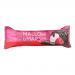 A dark chocolate-coated bar reveals a soft, vivid raspberry-pink marshmallow core. The glossy chocolate shell shows delicate ripples and a thin drizzle; the cross-section exposes airy texture with tiny fruit flecks, scattered crumbs and a faint dusting of cocoa. Soft sheen pairs with matte interior.