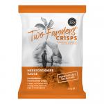 A neat display of small Two Farmers Herefordshire Sauce crisp packets fills the frame, twenty-four identical bags are arranged in tidy rows inside a shallow box. The brand logo and flavor name stand out against earthy tones; light reflects off crinkled foil and reveals textured crisps.