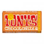 A bright, graphic wrapper shows a bold Tony's Chocolonely logo across the center with off-kilter, chunky bar segments illustrated beneath. Vivid colors and hand-drawn lines frame a milk chocolate bar broken to reveal gooey caramel and scattered sea salt crystals.