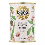 A photo shows six 400 g Biona Organic pinto bean packs arranged together. Each pack features the Biona logo, an 'organic' label and an image of pinto beans on a green-and-cream background; product text and net weight appear on the front.