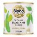 Photo shows a green-and-white 200g packet of Biona Organic Edamame Beans standing upright on a plain surface. The front displays the Biona logo, bold product name, a close-up edamame image, organic certification mark and simple icons; a subtle textured background frames the design. A pale low shadow.