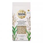 A kraft-style pouch shows Biona Organic Himalayan Basmati Brown Rice in earthy brown and green tones. A clear window reveals long brown grains. Organic seals, a stylized mountain graphic and simple sans-serif type create a clean, natural packaging look with a soft matte finish and subtle texture...