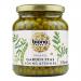 A bright, green Biona Organic Garden Peas package sits front and center, the Biona logo prominent at the top. A cluster of glossy peas spills from a wooden scoop across the foreground. The label shows organic badges, the product name and weight against a clean white background. with soft highlights .