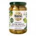 A clear glass jar holds glossy green Greek Queen olives, each pitted and stuffed with bright jalapeño slices, submerged in pale brine. A natural-toned label displays organic branding and product name; light reflections and droplets accentuate the texture and sheen.