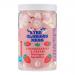 A scattered mix of tiny meringue kisses in soft pink and creamy white, with swirls, chips and irregular shards. Fine sugar crystals glint on the matte surface, creating a delicate, crumbly texture against a neutral backdrop, hinting at strawberry tones and airy lightness. Scattered in a dish nearby