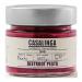 A clear glass jar shows vivid magenta beetroot pesto with a slightly chunky, glossy texture and green herb flecks. A white label bears the Casalinga logo in simple type with green and red accents; a metal screw lid tops the jar against a neutral background.