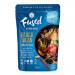A squat glass jar with a matte black screw cap contains glossy, dark-brown stir-fry sauce. A cream wraparound label features Fused by Fiona Uyema in flowing script, Black Bean Stir Fry Sauce 125g in bold type, subtle soy-bean graphics and minimal nutritional icons.