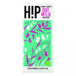 A slim chocolate bar rests in a matte sleeve with bold H!P lettering and warm beige and deep-brown accents. Foil peels back to reveal smooth, glossy oat milk chocolate divided into clean, square segments with a subtle sheen and fine, even texture.