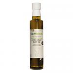 Six slender green glass bottles stand in a neat row, each capped with a dark screw top. Cream labels display the Olive Branch name and a simple olive-sprig illustration. Warm studio light illuminates the golden-green oil, creating soft reflections and subtle shadows on a white surface. Clean, crisp.
