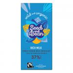 A rectangular chocolate bar in a pale kraft-paper wrapper showing Seed & Bean branding. The front shows Plain Milk 37% text and organic/fair-trade icons, with an illustration of chocolate squares, scattered seeds, and green accent details.