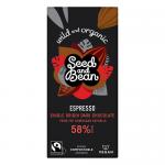 A dark brown chocolate bar sits on a natural kraft wrapper stamped with bold black text. Whole espresso beans and ten small seeds scatter nearby on a textured surface. Packaging displays organic and fair-trade icons and a clear cocoa percentage in simple, rustic styling. Close-up shows glossy sheen.