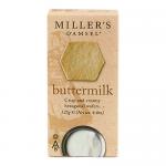 Photo shows a carton of Miller’s Damsel Buttermilk Wafers beside several thin, golden-brown round wafers. The biscuits reveal delicate, crisp edges and a fine, slightly mottled surface. Packaging and biscuits sit on a neutral background.