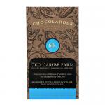 A flat pack of ten individually wrapped Chocolarder Oko Caribe Farm 55% milk chocolate bars sits against a plain white background. Earthy brown and teal wrappers feature simple farm illustrations, gold lettering and a neat repeated logo pattern, with edges slightly overlapping. Subtle sheen on pack.