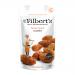A bright packet of Mr Filberts Moroccan Spiced Almonds sits against a neutral background. Warm orange and brown tones on the packaging feature stylized spice motifs and almonds; a clear window reveals glossy, spice-coated almonds clustered inside, with product name and brand logo prominent. Accents.