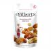 A bright, glossy packet displays the Mr Filberts logo above the bold 'Mexican Sweet Chilli' title with small chilli illustrations. A clear window reveals a mix of almonds, cashews and peanuts coated in a red glaze, set against a clean white background. Vibrant red and green accents frame the design.