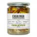 The jar displays a colorful antipasto submerged in golden oil, layering roasted red peppers, green olives, artichoke hearts, and sun-dried tomatoes. Labels show rustic Italian branding while light catches the glass, highlighting textures and vibrant Mediterranean hues. with flecks of herb and garlic