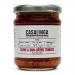 A clear glass jar shows chunky, dark-olive and sun-dried tomato tapenade with visible flecks of herbs and oil. A simple label around the jar displays the Casalinga brand and product name and the 190g weight; a metal lid seals the jar against a plain background.